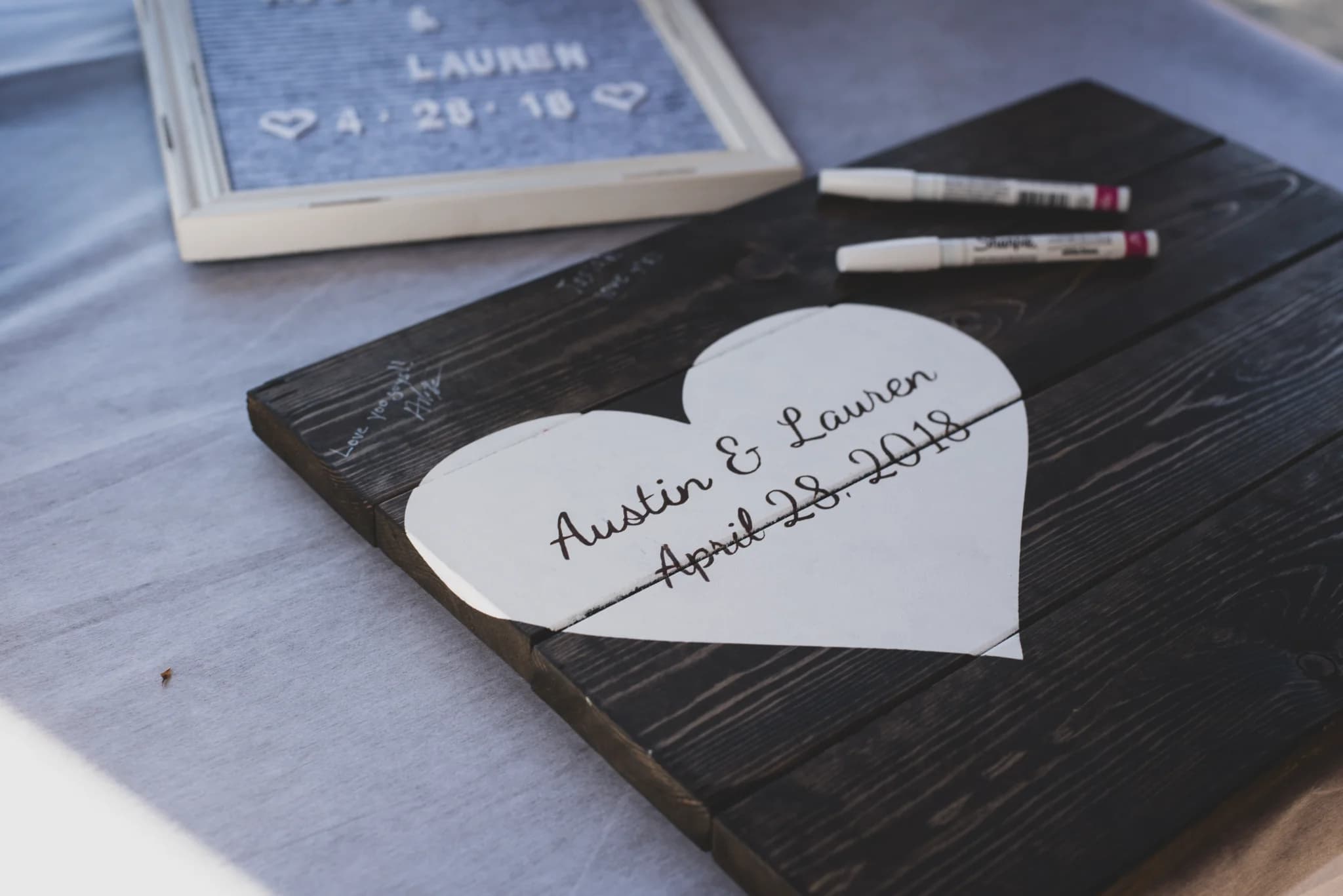 Rustic wooden heart wedding guest book sign at Moose Hollow Lodge in Pigeon Forge