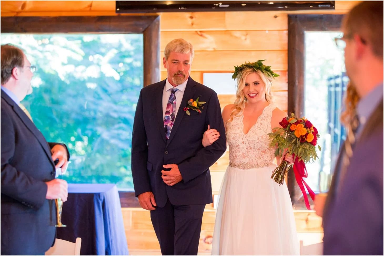 Bride and father walking down the aisle in rustic wedding chapel at Moose Hollow Lodge in Pigeon Forge
