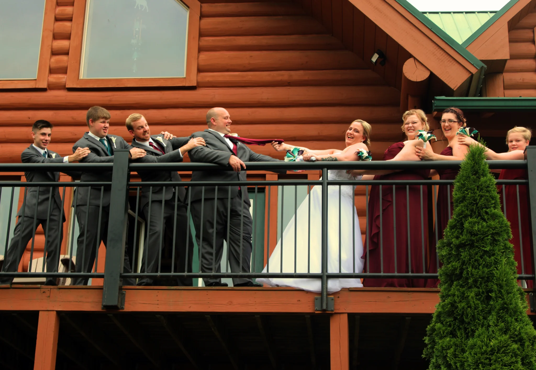 Wedding party on cabin deck at Moose Hollow Lodge in Pigeon Forge near Dollywood and Smoky Mountains