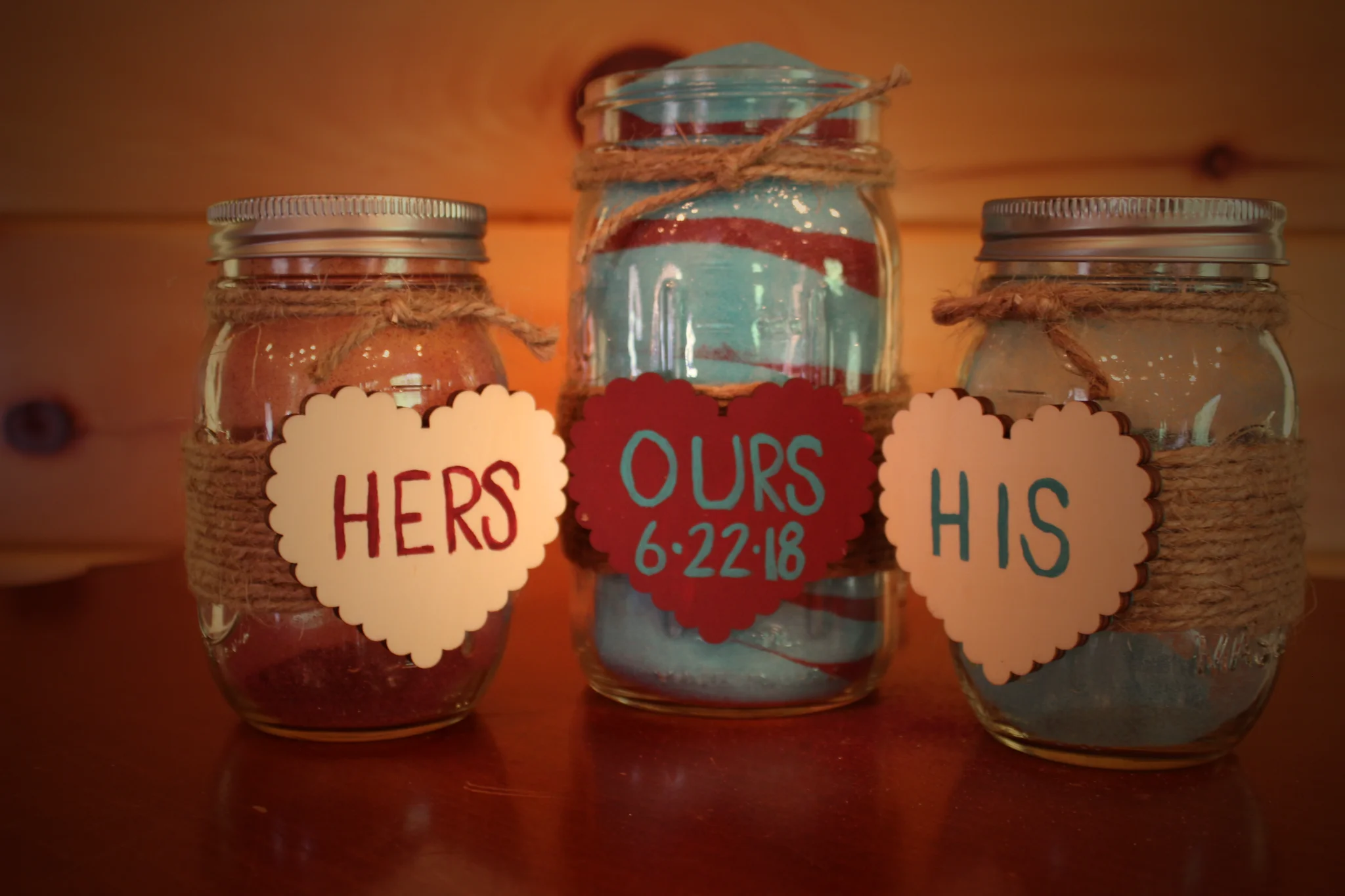 Wedding sand ceremony jars with hearts and twine at Moose Hollow Lodge in Pigeon Forge