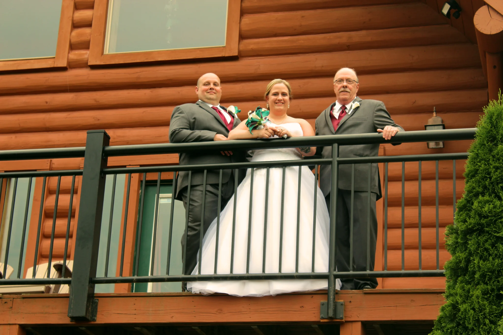 Wedding party on rustic cabin deck near Dollywood at Moose Hollow Lodge in Pigeon Forge