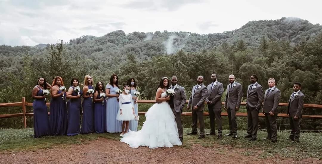 Wedding party on outdoor lawn with Smoky Mountain views at Moose Hollow Lodge in Pigeon Forge near Dollywood