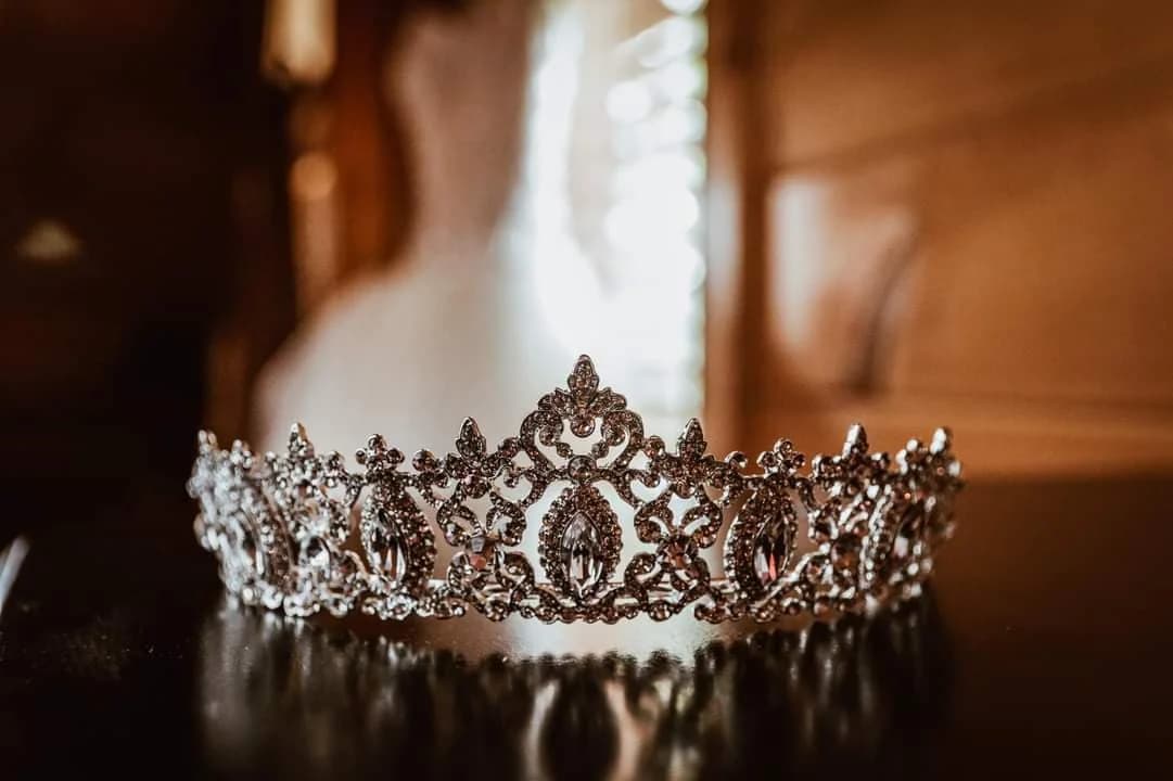 Sparkling crystal bridal tiara with wedding dress detail at Moose Hollow Lodge in Pigeon Forge