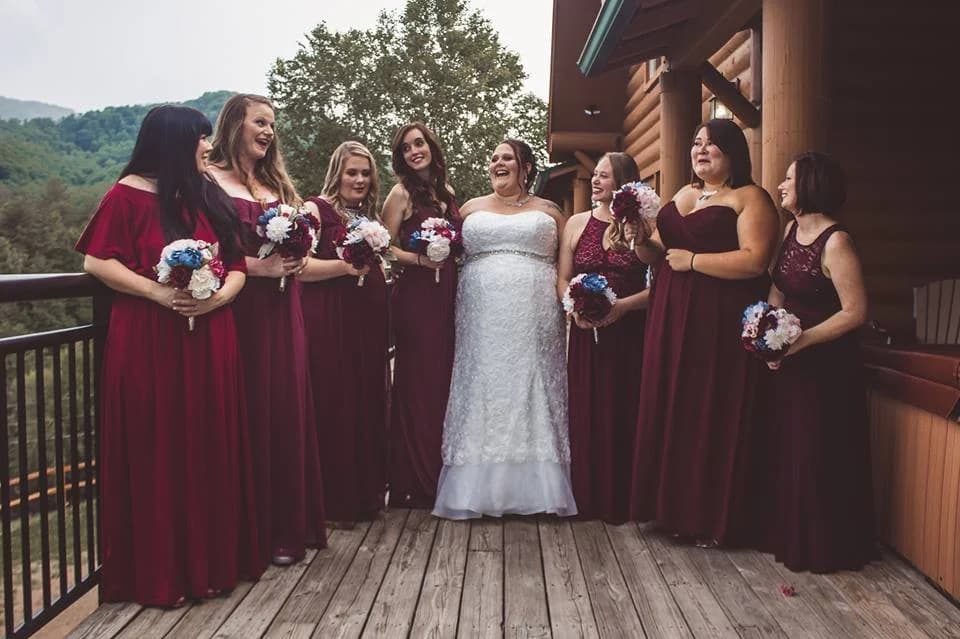 Bride and bridesmaids on deck with Smoky Mountains views at Moose Hollow Lodge in Pigeon Forge near Dollywood