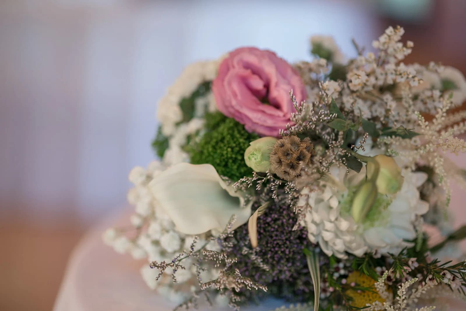 Close-up of elegant wedding floral bouquet with pink and white blooms at Moose Hollow Lodge in Pigeon Forge