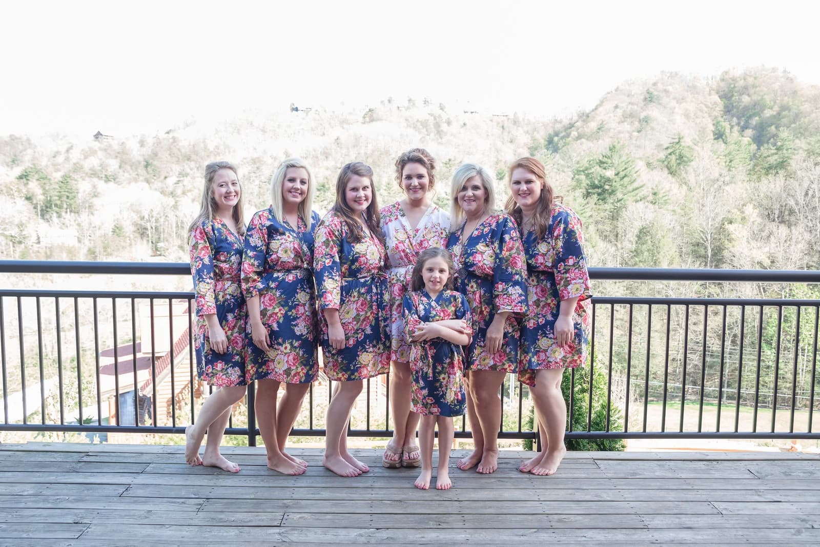 Bridesmaids on a deck with Smoky Mountain views at Moose Hollow Lodge in Pigeon Forge near Dollywood