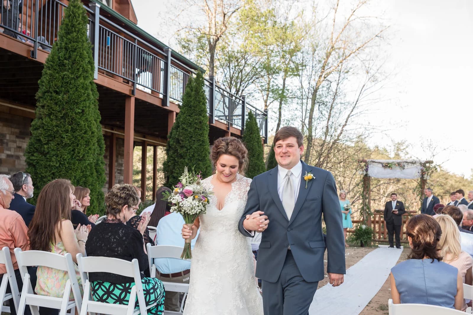 Outdoor wedding ceremony with bride and groom at Moose Hollow Lodge in Pigeon Forge near Dollywood and Smoky Mountains