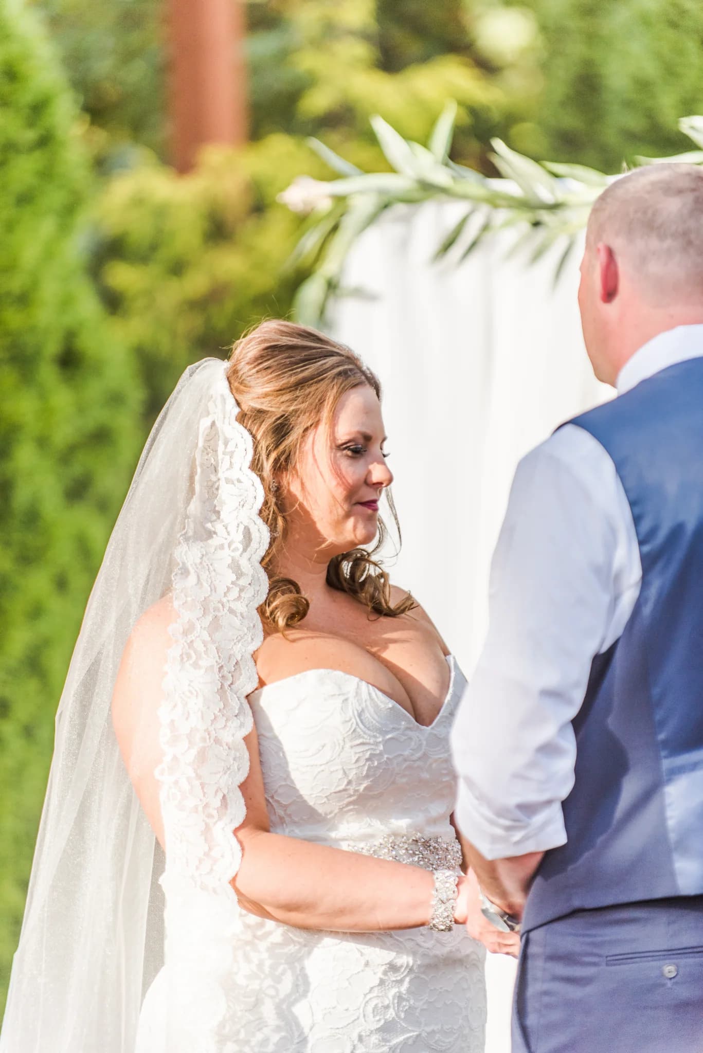 Outdoor wedding ceremony with bride and groom near the Smoky Mountains at Moose Hollow Lodge in Pigeon Forge