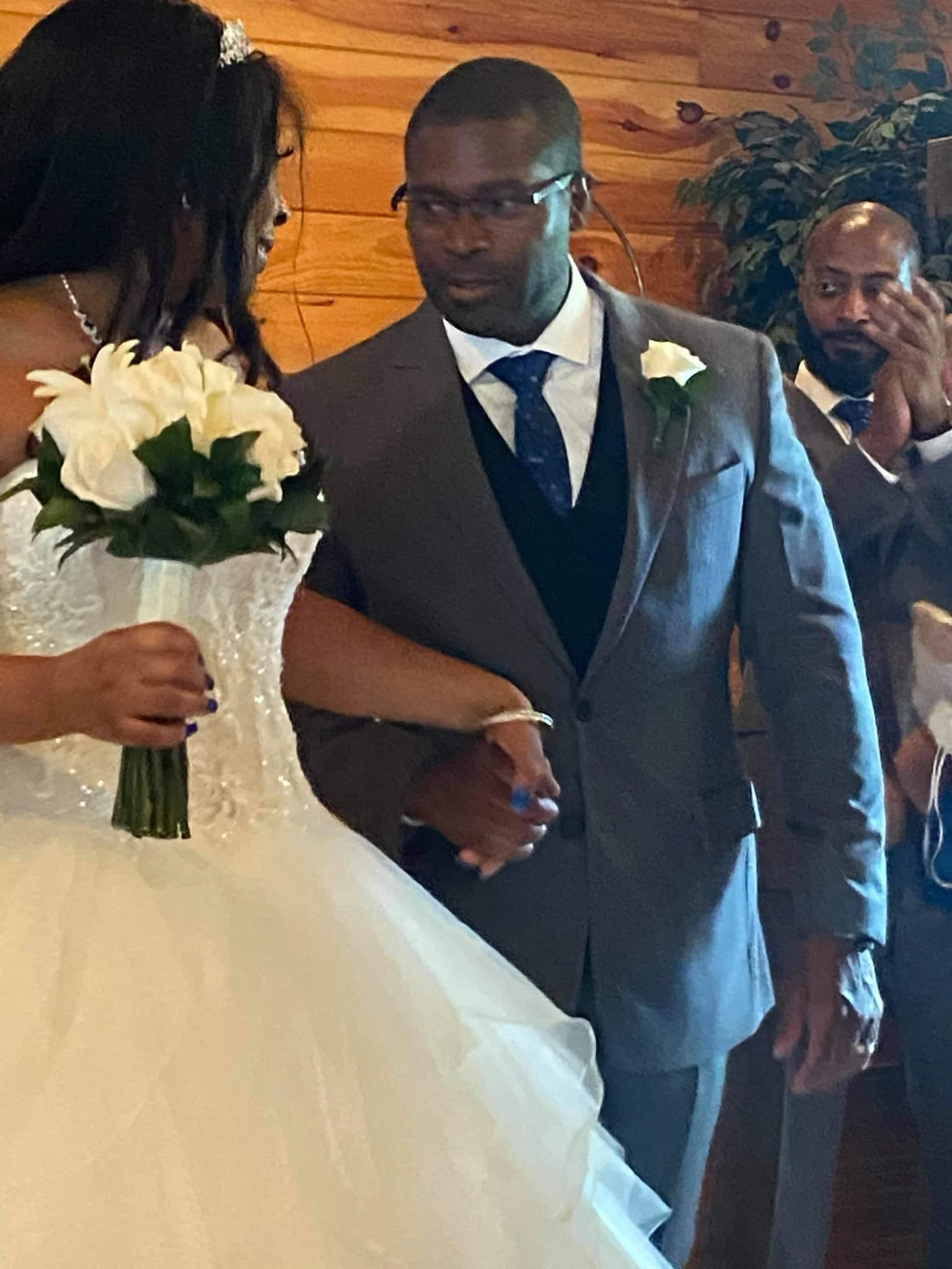 Rustic indoor wedding ceremony with bride and groom at Moose Hollow Lodge in Pigeon Forge