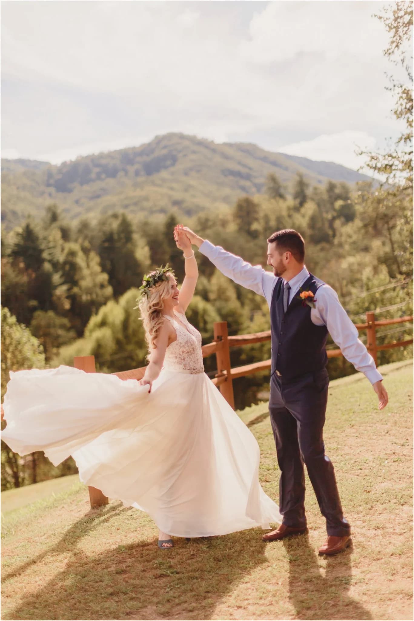 Wedding couple dancing with scenic Smoky Mountain views near Dollywood at Moose Hollow Lodge in Pigeon Forge