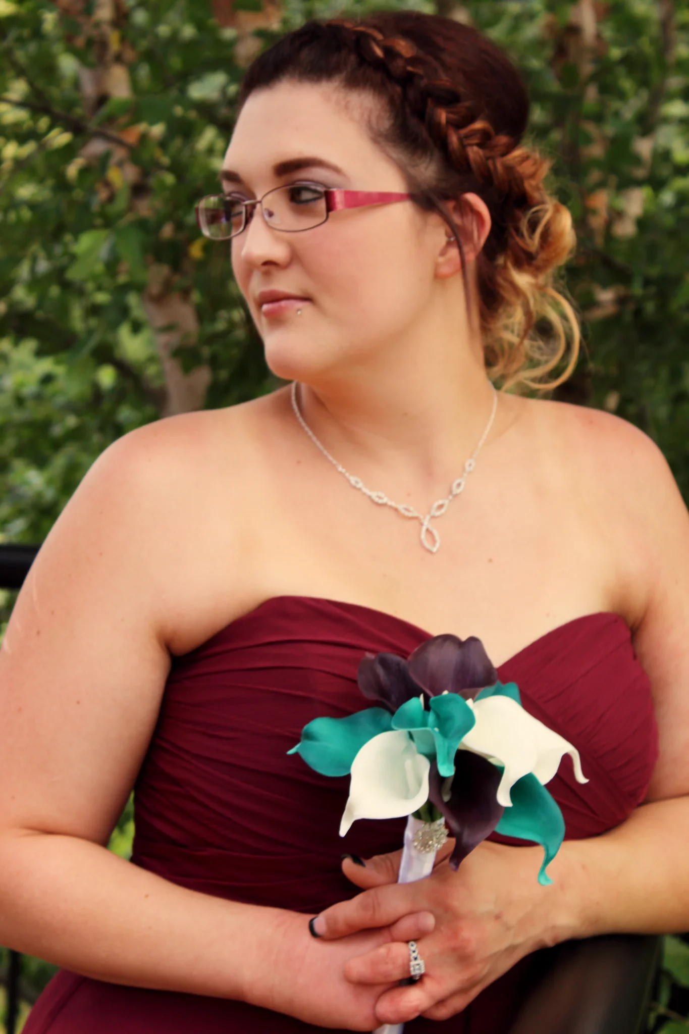 Bridesmaid in burgundy dress with bouquet at Moose Hollow Lodge near Dollywood in the Smoky Mountains