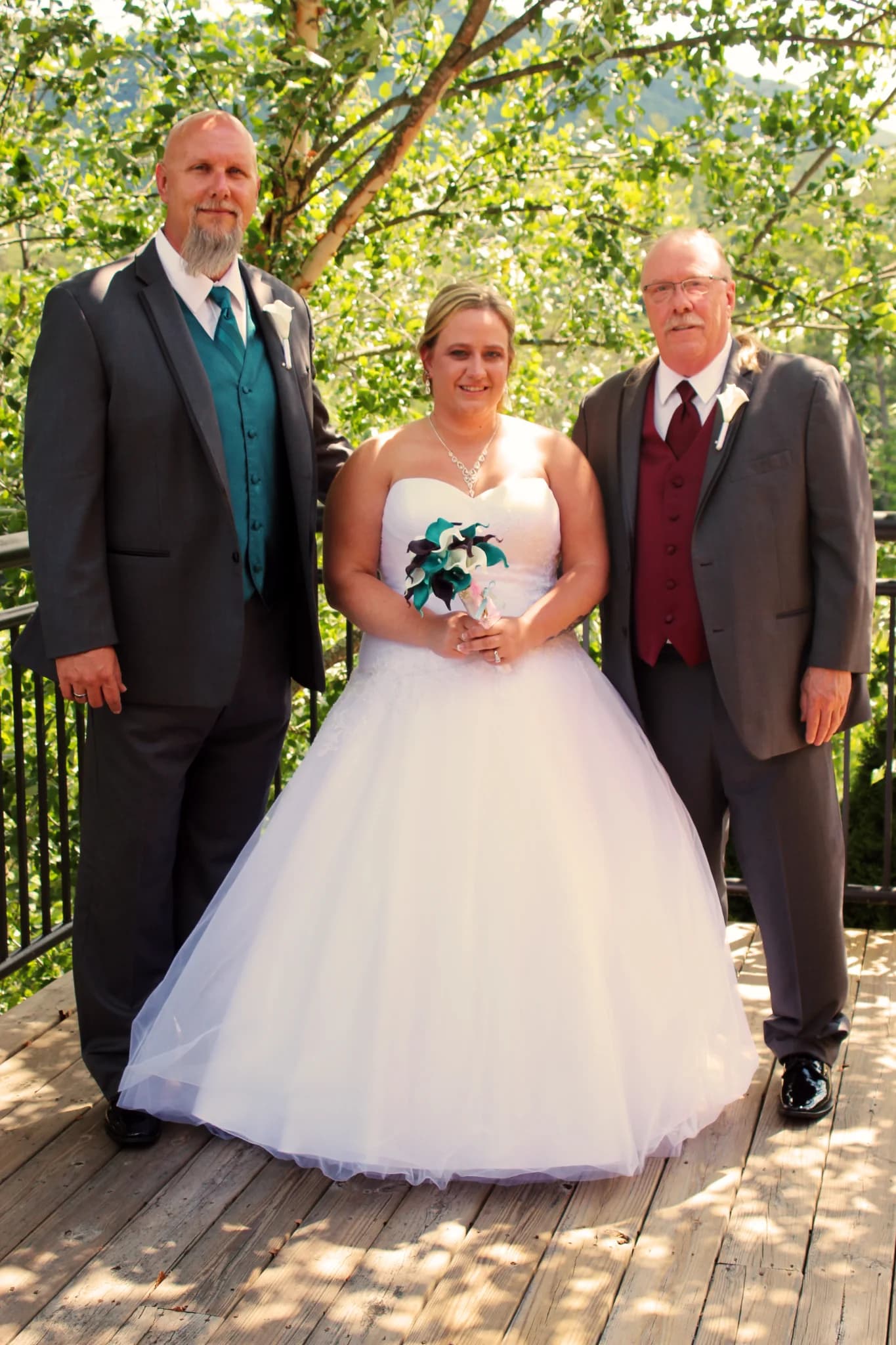 Wedding party on scenic outdoor deck with mountain views at Moose Hollow Lodge in Pigeon Forge near the Smoky Mountains