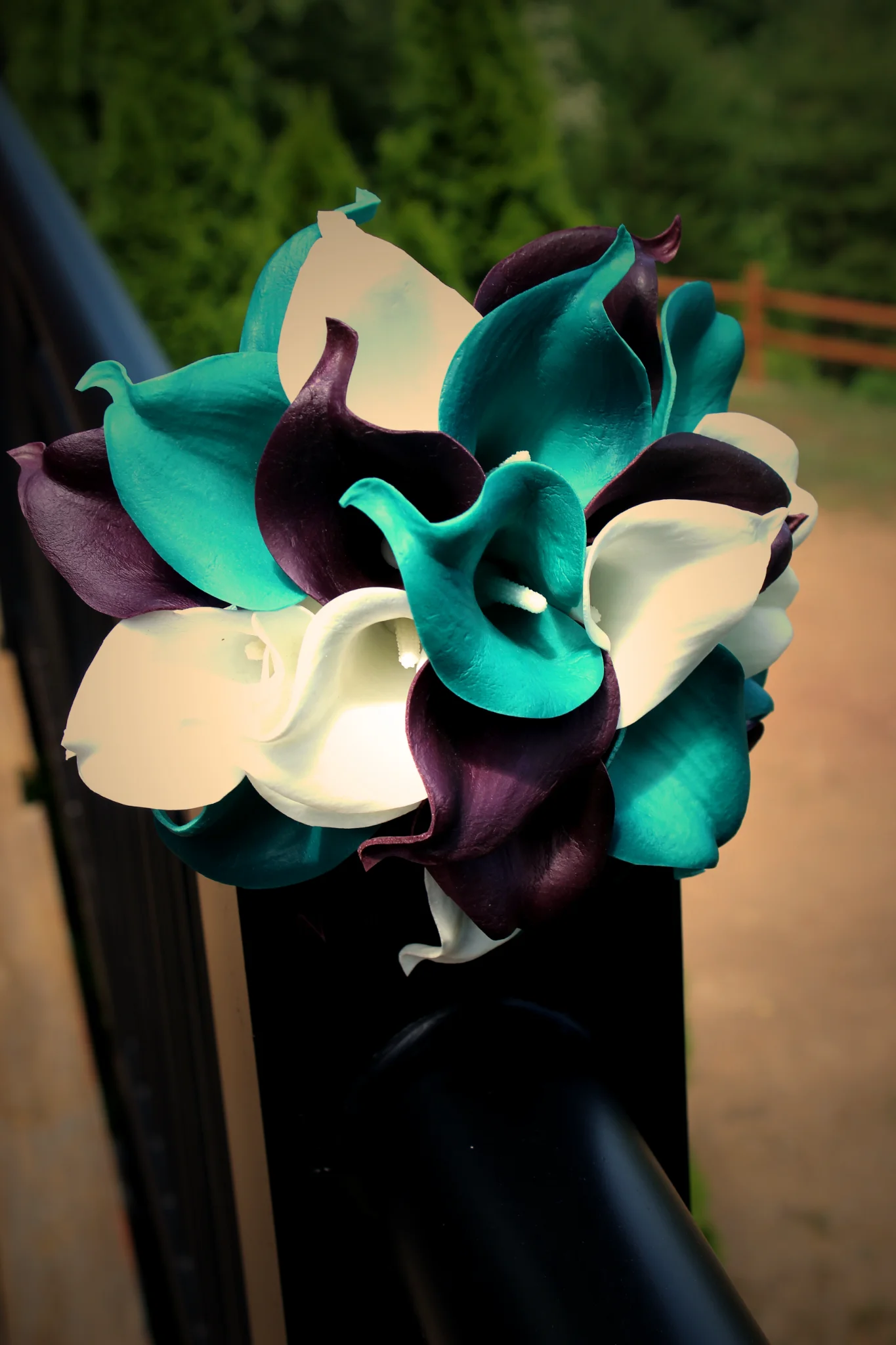 Teal and purple calla lily wedding bouquet at Moose Hollow Lodge in Pigeon Forge near Dollywood and Smoky Mountains