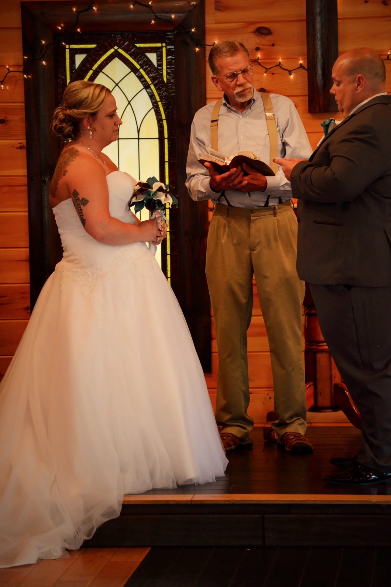 Bride and groom at a rustic chapel wedding ceremony at Moose Hollow Lodge in Pigeon Forge