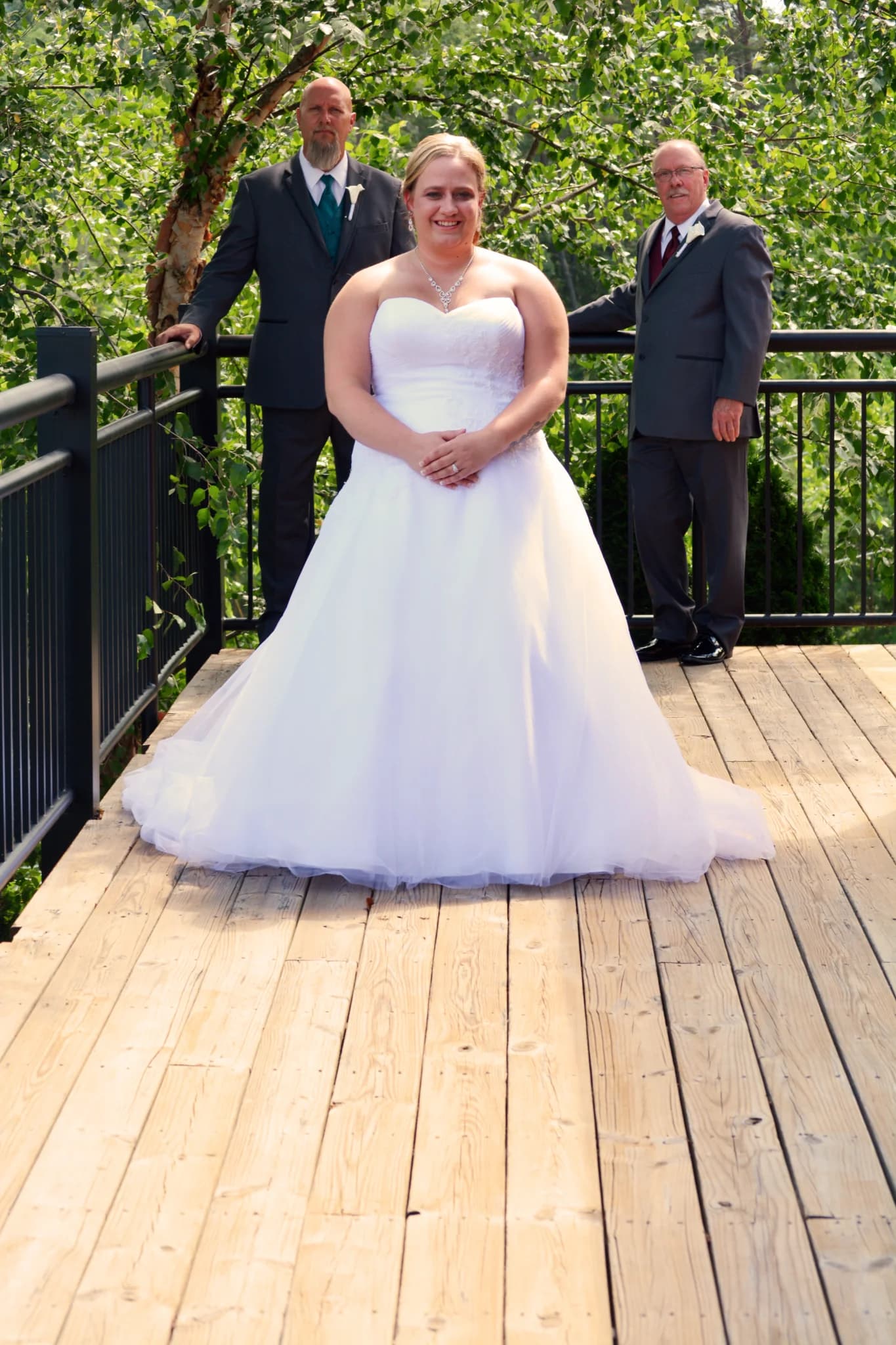 Bride on scenic outdoor wedding deck with forest views at Moose Hollow Lodge in Pigeon Forge near Smoky Mountains