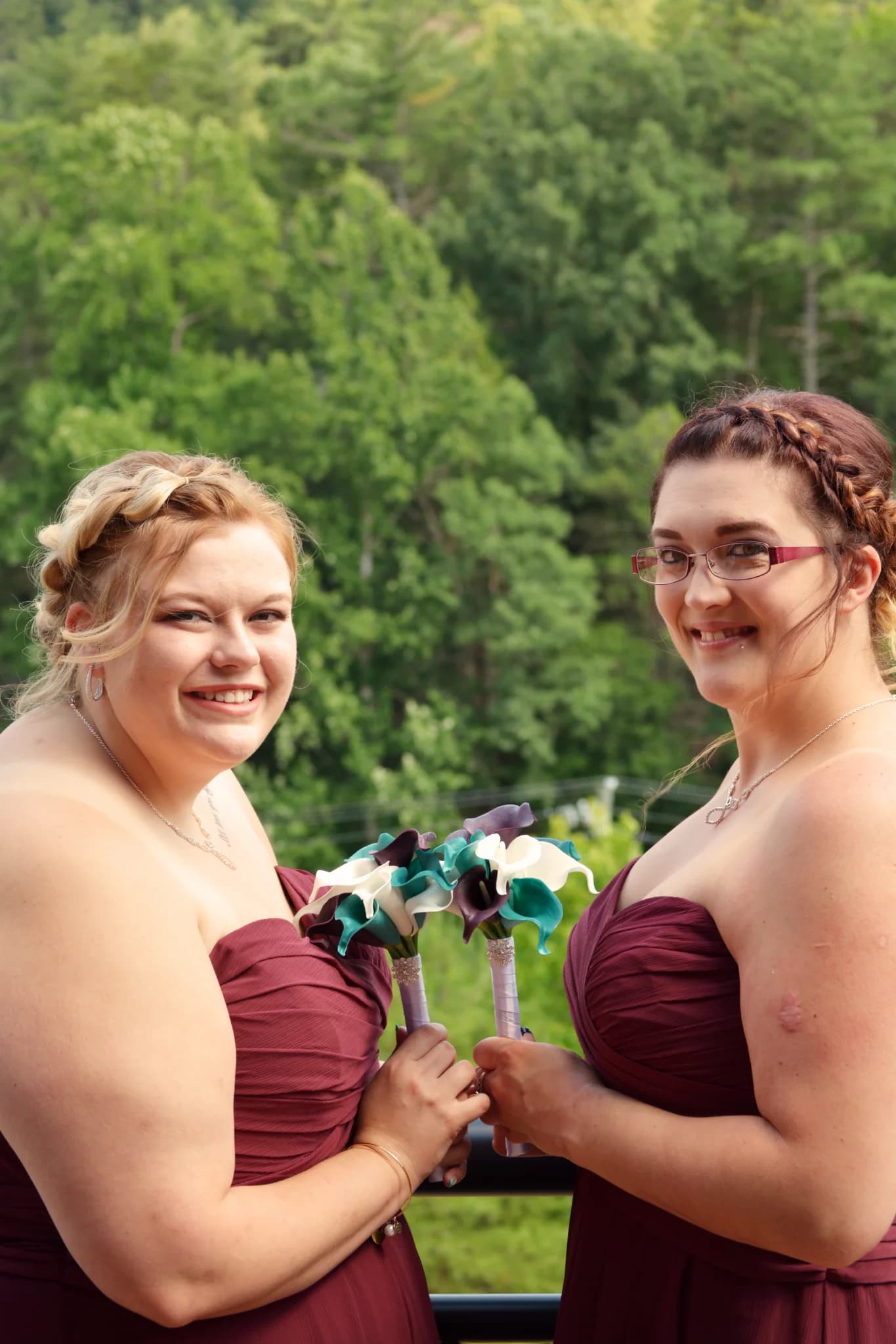 Bridesmaids with bouquets and forest views at Moose Hollow Lodge in Pigeon Forge near the Smoky Mountains